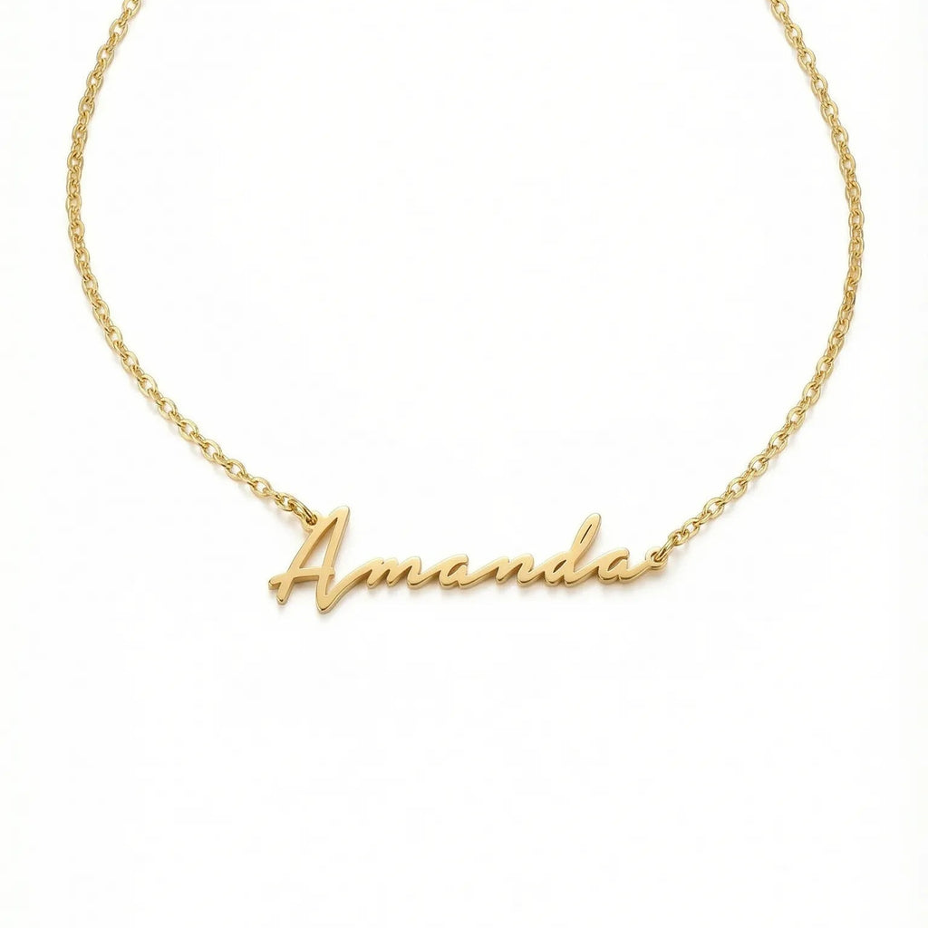 Gold necklace with 'Amelia' engraved on a white background