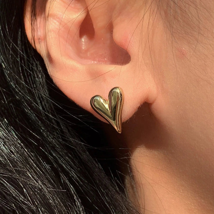 Pendientes de botón en forma de corazón